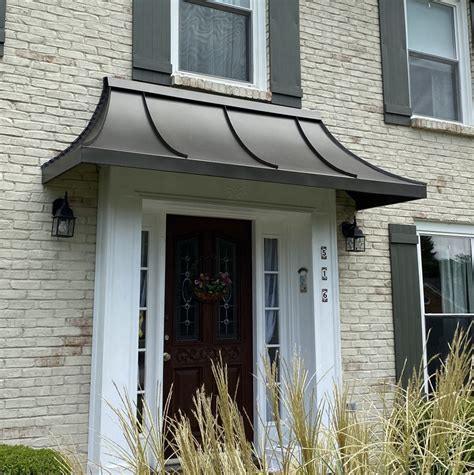 metal awning to keep rain away from house|residential metal awnings for doors.